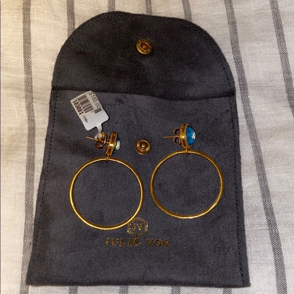 Gold hoops with bright blue stone